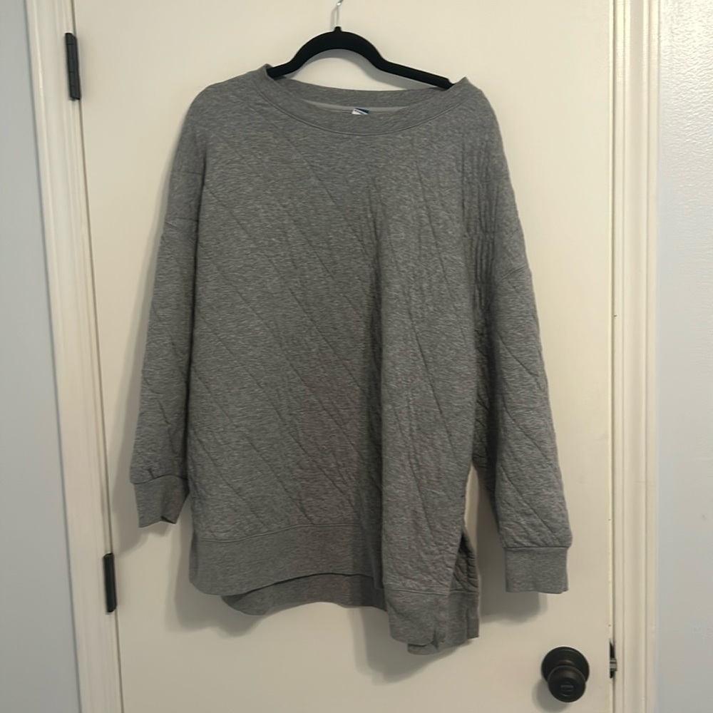 Quilted grey tunic.